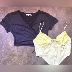 Green cropped corset shirt. Black cropped v-neck top.